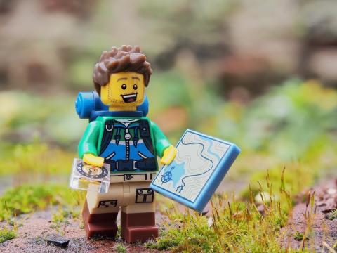 Lego minifigure on a nature hike.