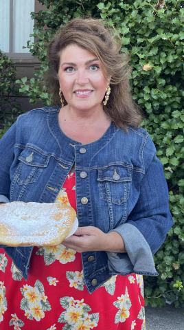 woman in jean jacket and red dress
