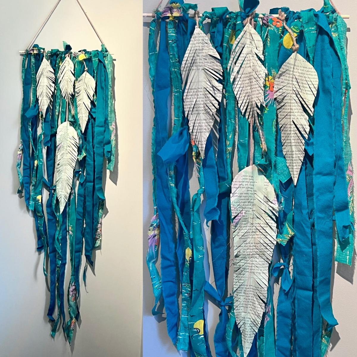 Upcycled feather wall hanging on wall