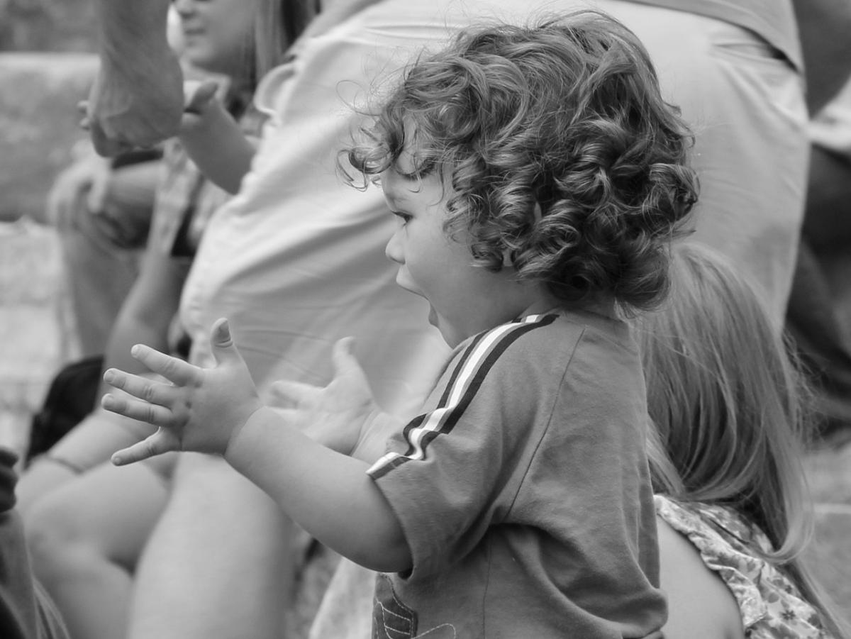 Toddler clapping.